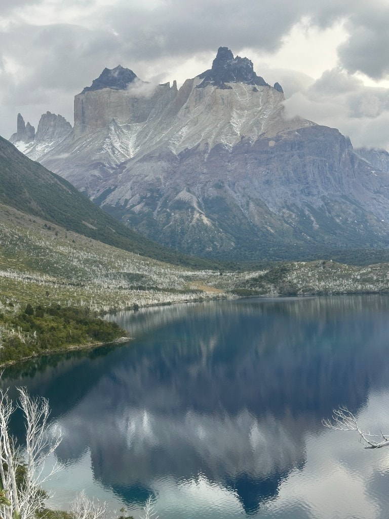 Torres del Paine peaks reflected in a calm Patagonian lake
