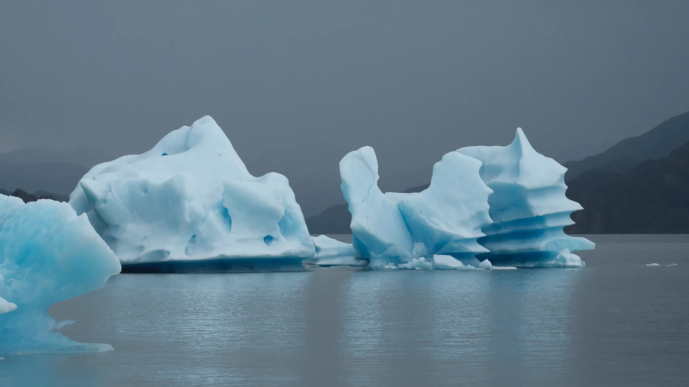 Blue icebergs floating on Lago Grey, Torres del Paine